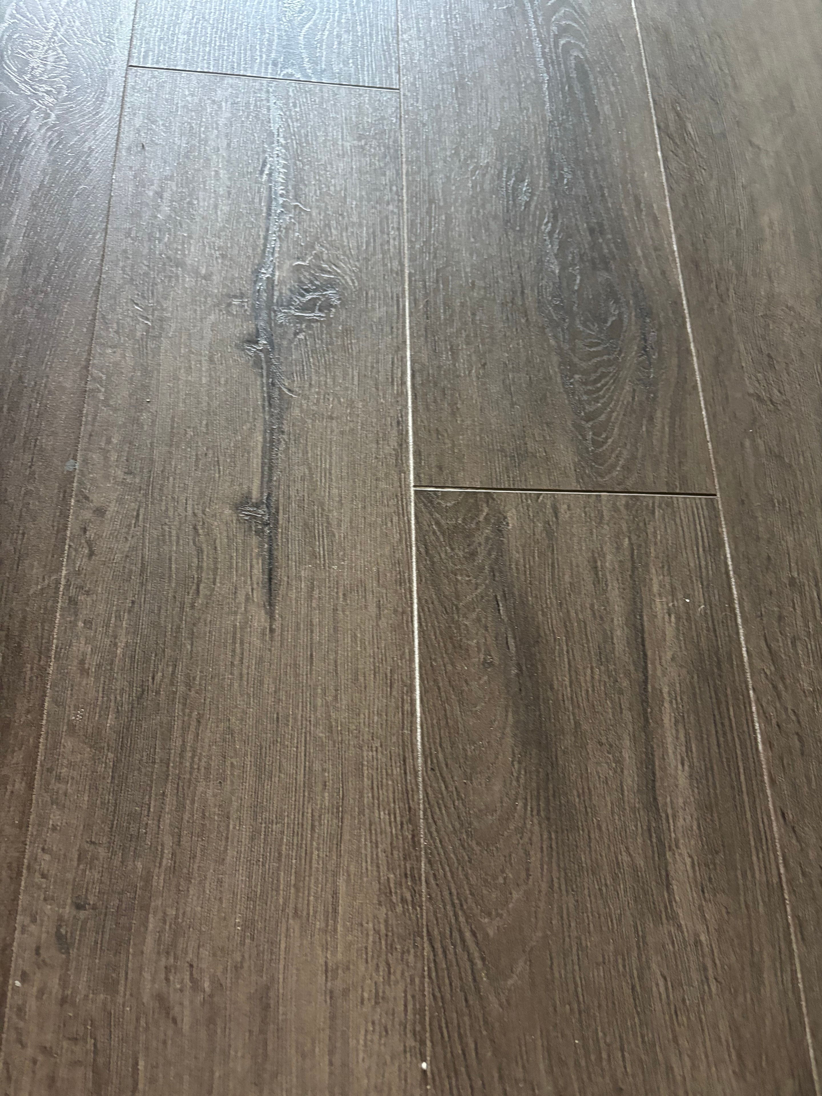 NorthStar team scrubbing floors on hands and knees