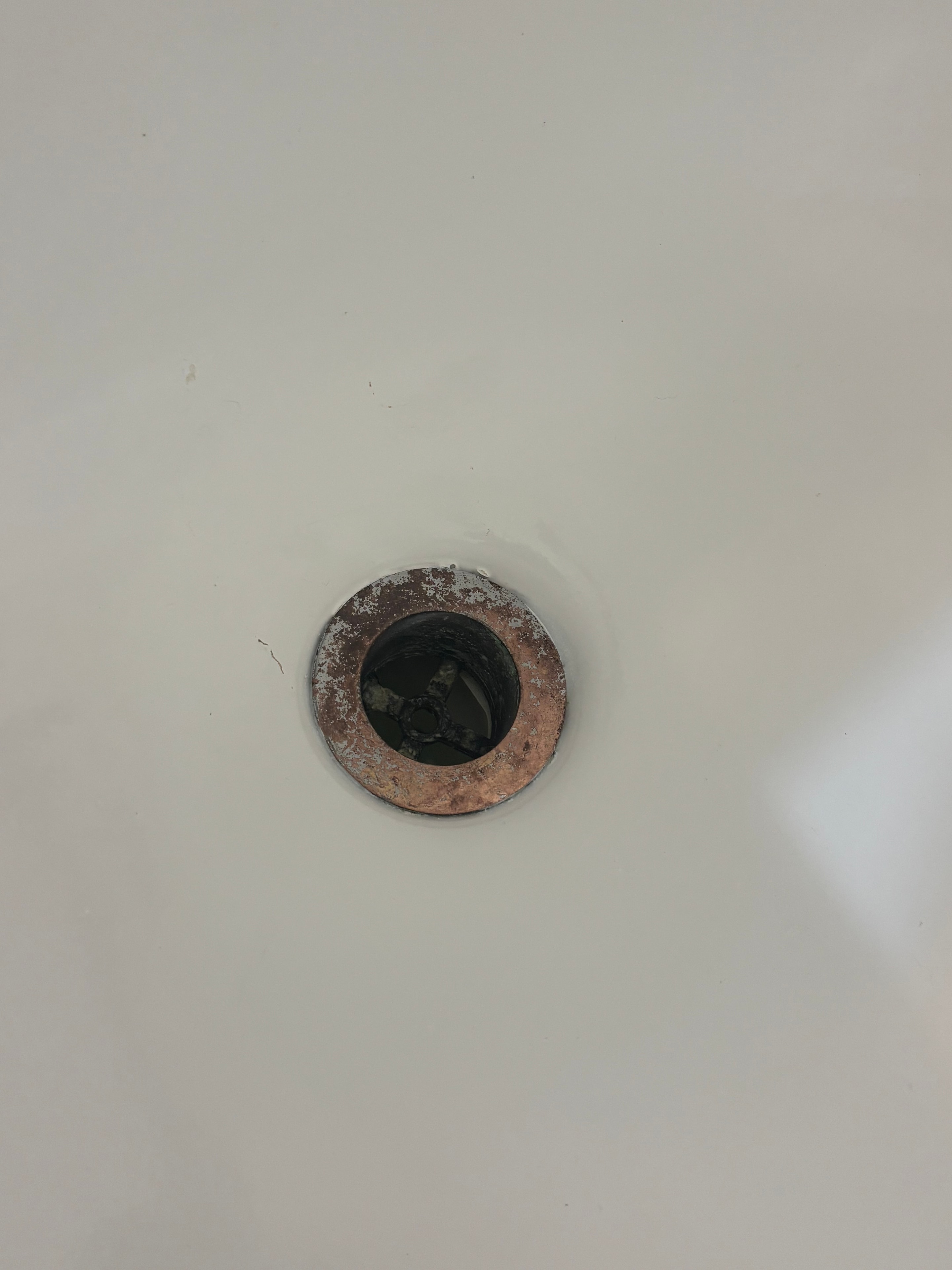 Corroded rusty drain before cleaning