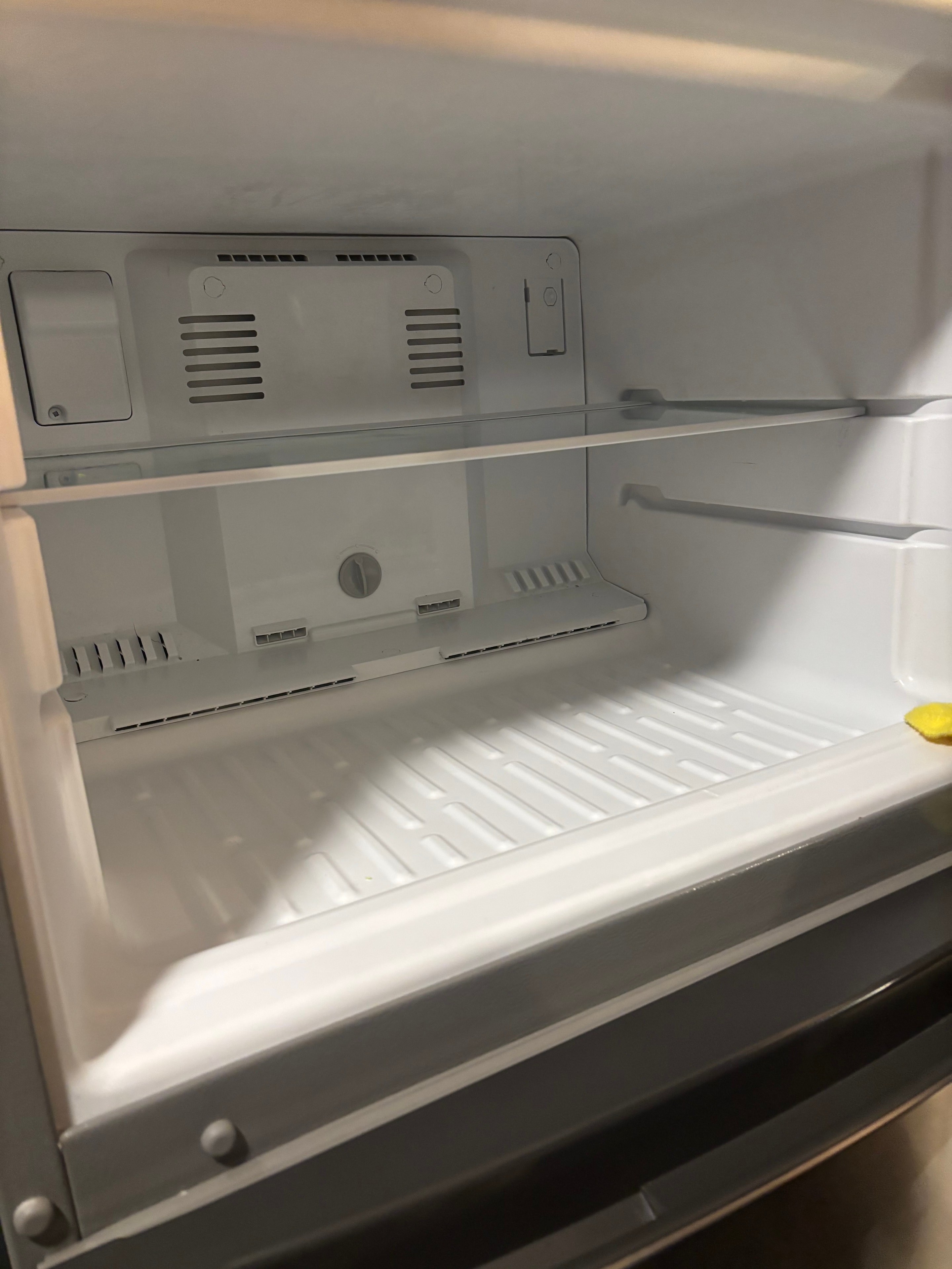 Freezer drawer spotless white after cleaning