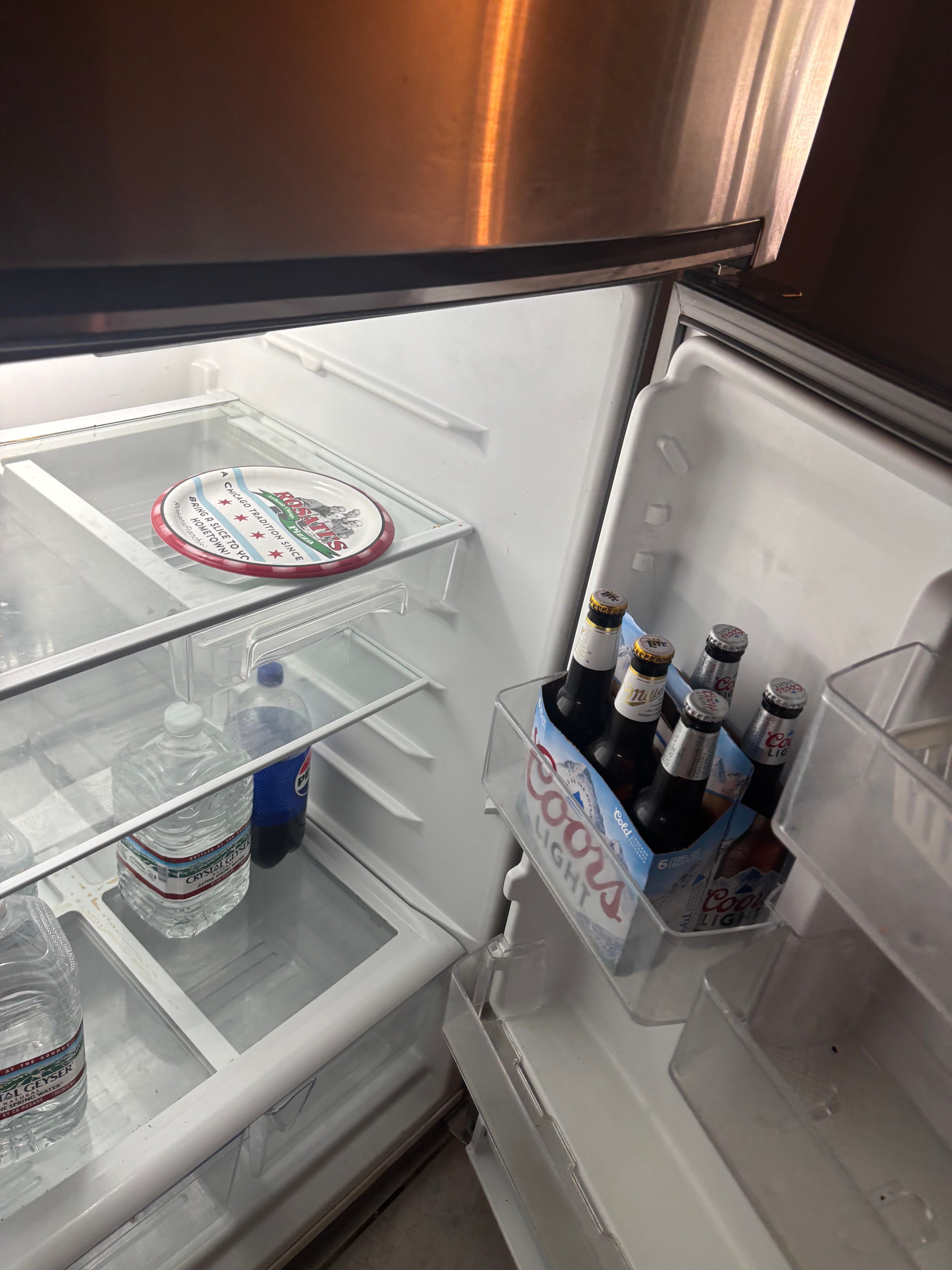 Refrigerator full of food and dirty before cleaning