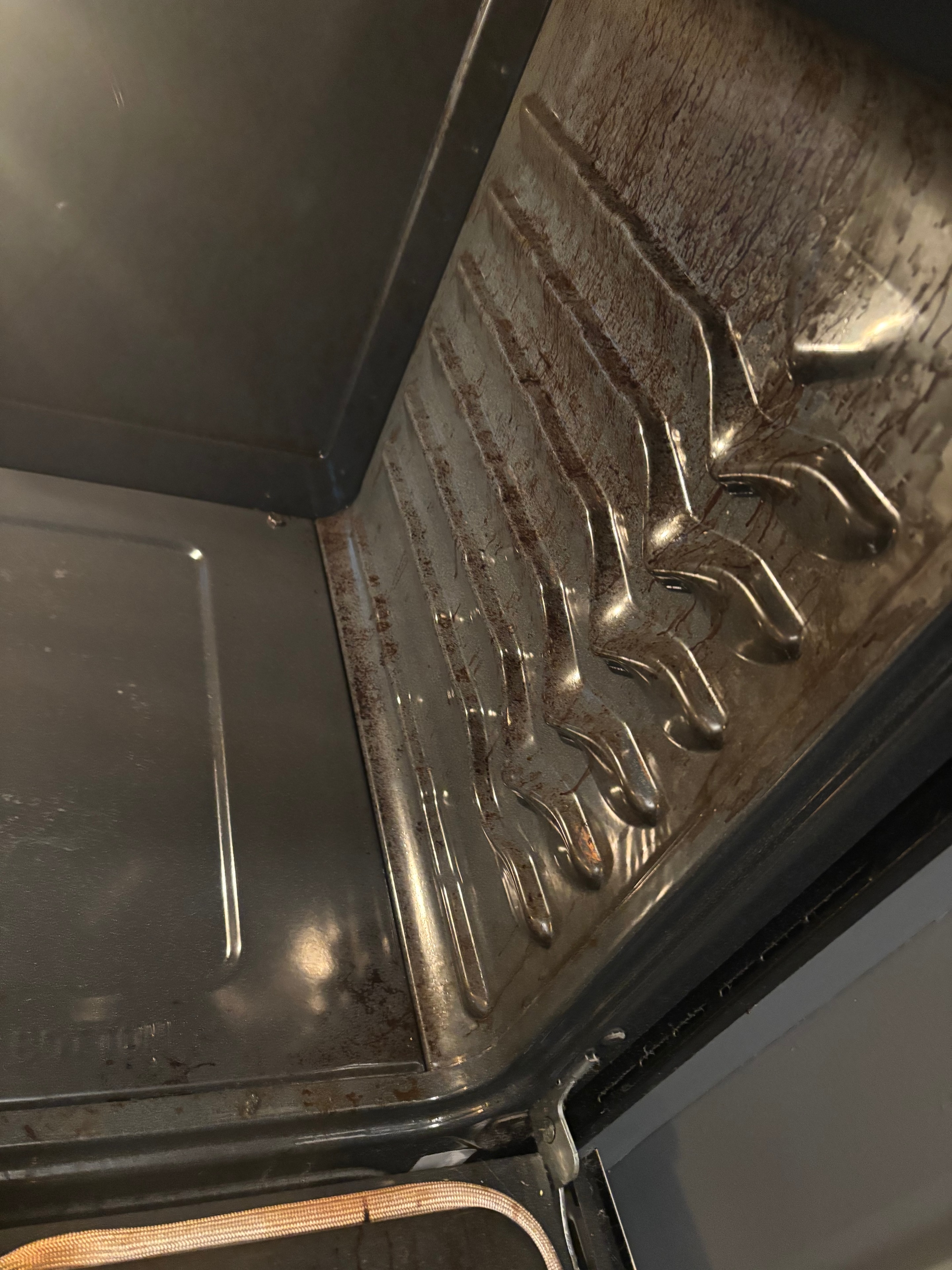 Oven floor spotless clean after cleaning