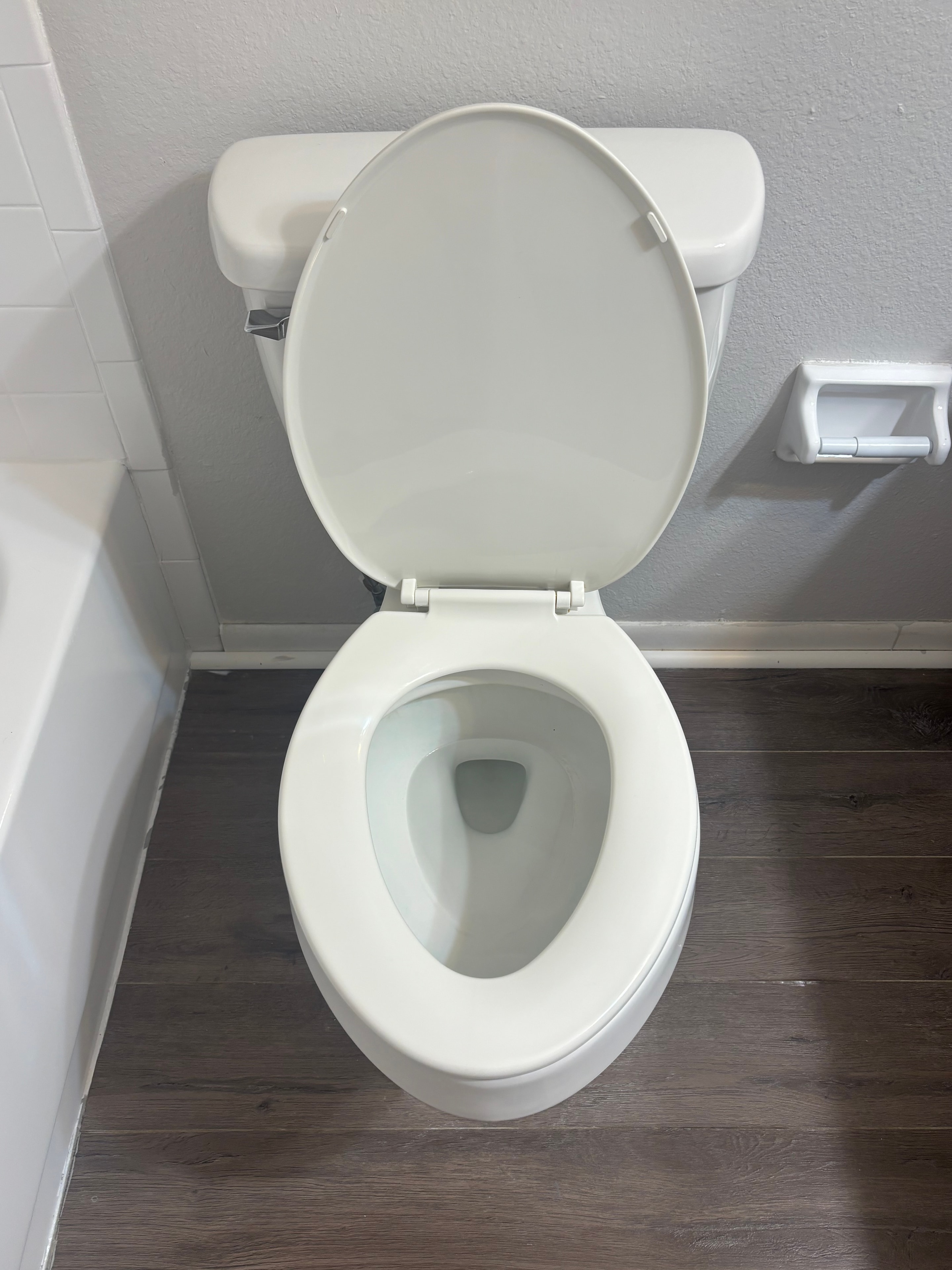 Toilet fully cleaned and gleaming after cleaning