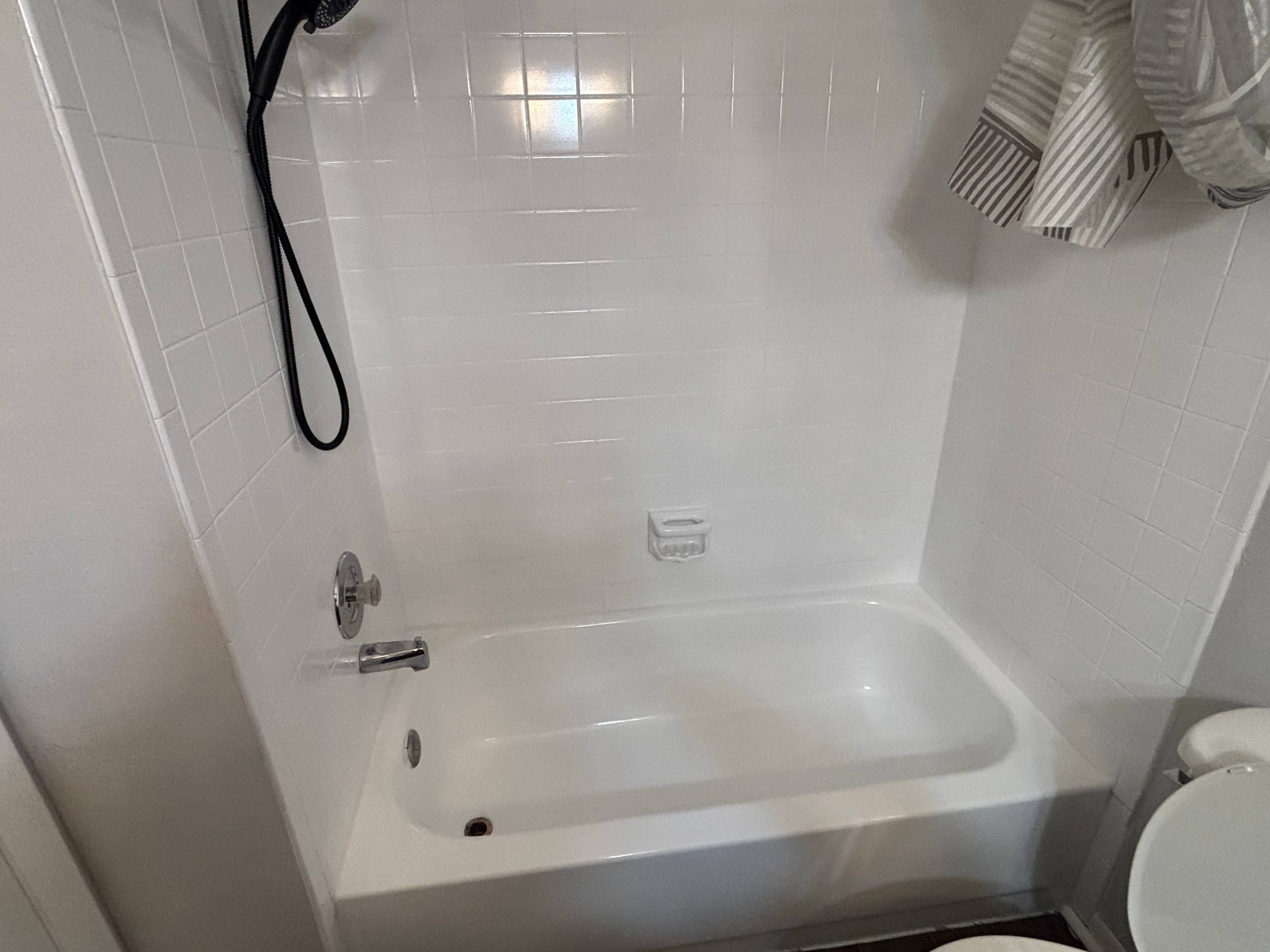 Bathtub chrome fixtures polished after cleaning